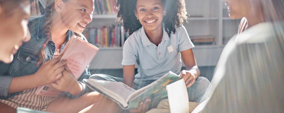 Books, storytelling or excited students reading in library for learning development or youth group growth. Smile, portrait or happy children with funny kids stories for education in school classroom.